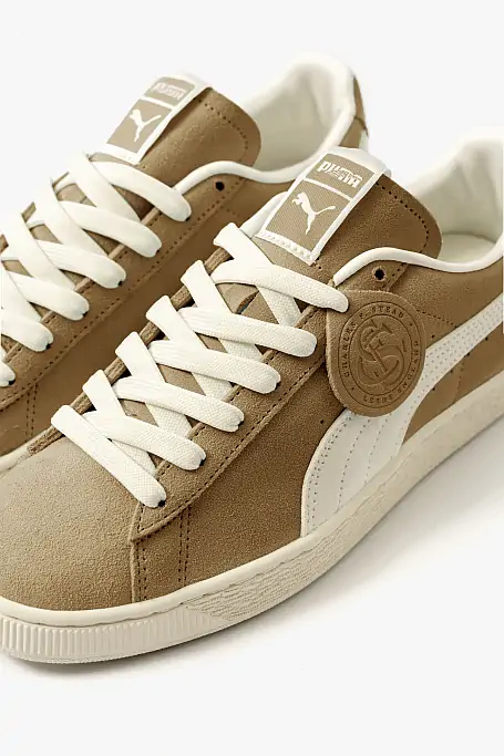 Close-up of PUMA x Charles F. Stead Suede in Honey Butter shade