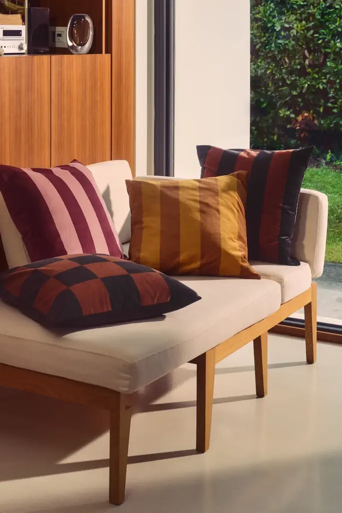 Velvet cushions on a mid-century modern couch